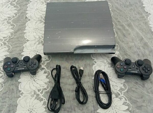 Console Sony PlayStation 3 avec 2 manettes