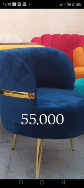 Un fauteuil  pouffe à dos