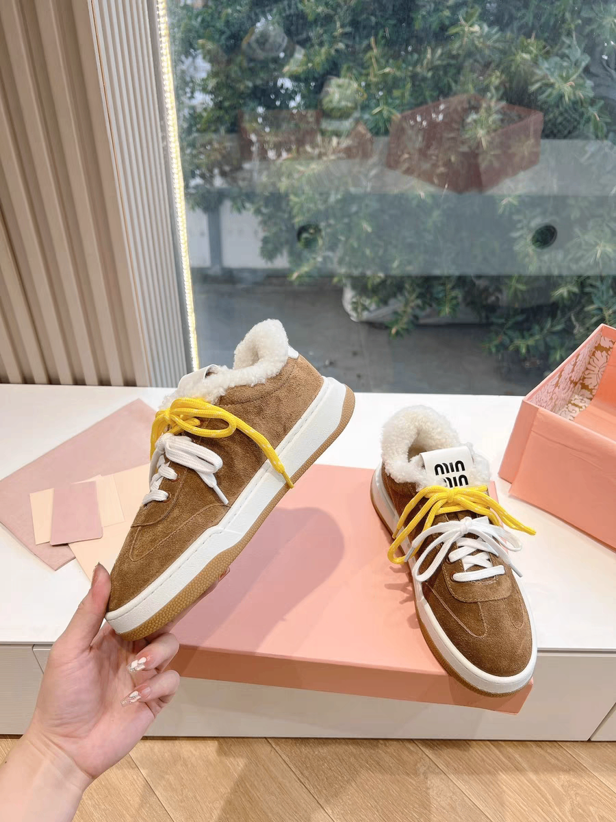 Кроссовки миумиу