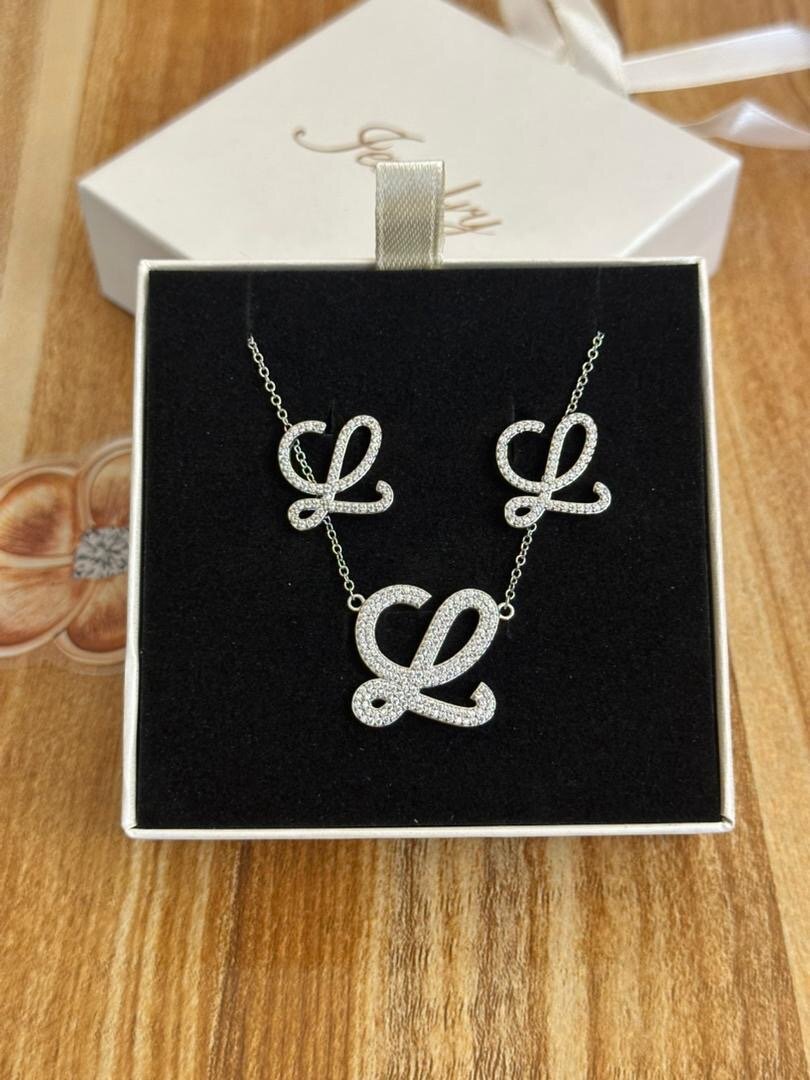 Ensemble collier et boucles d'oreilles Swarovski