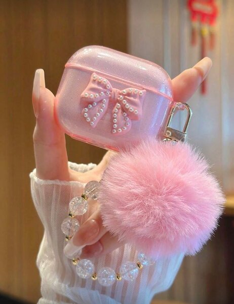 Étui AirPods rose avec pompon et noeud