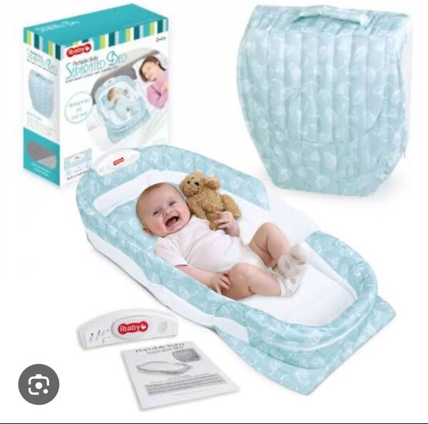 Couffin avec boîte à musique