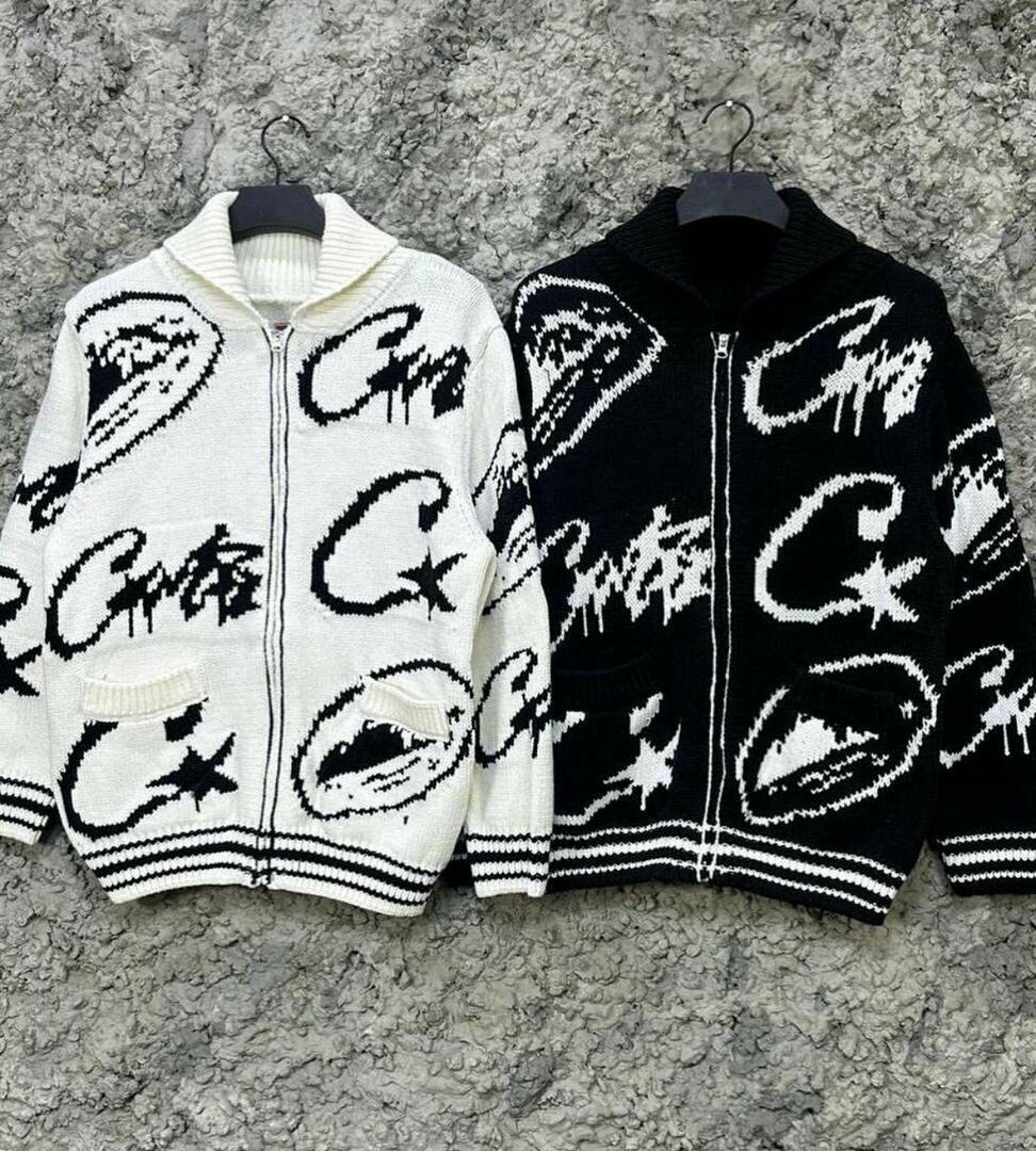 Veste en tricot à capuche et fermeture éclair