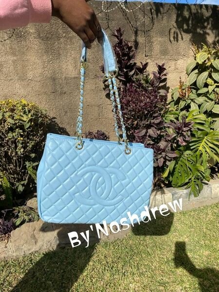 Women's Chanel bag in light blue color