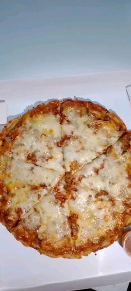 Pizza au fromage fondu