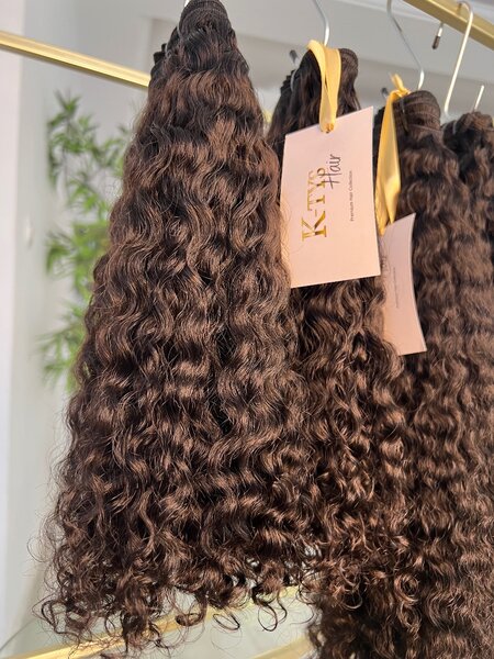 Extensions cheveux bouclés et lisses