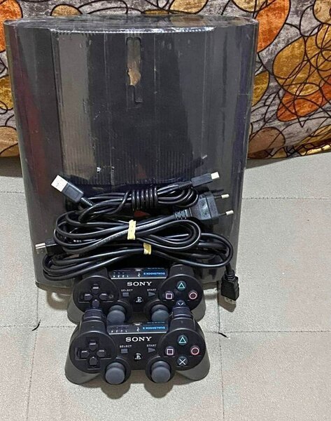 Console Sony PS3 avec manettes