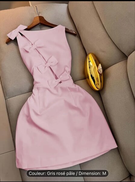 Robe élégante à nœuds roses