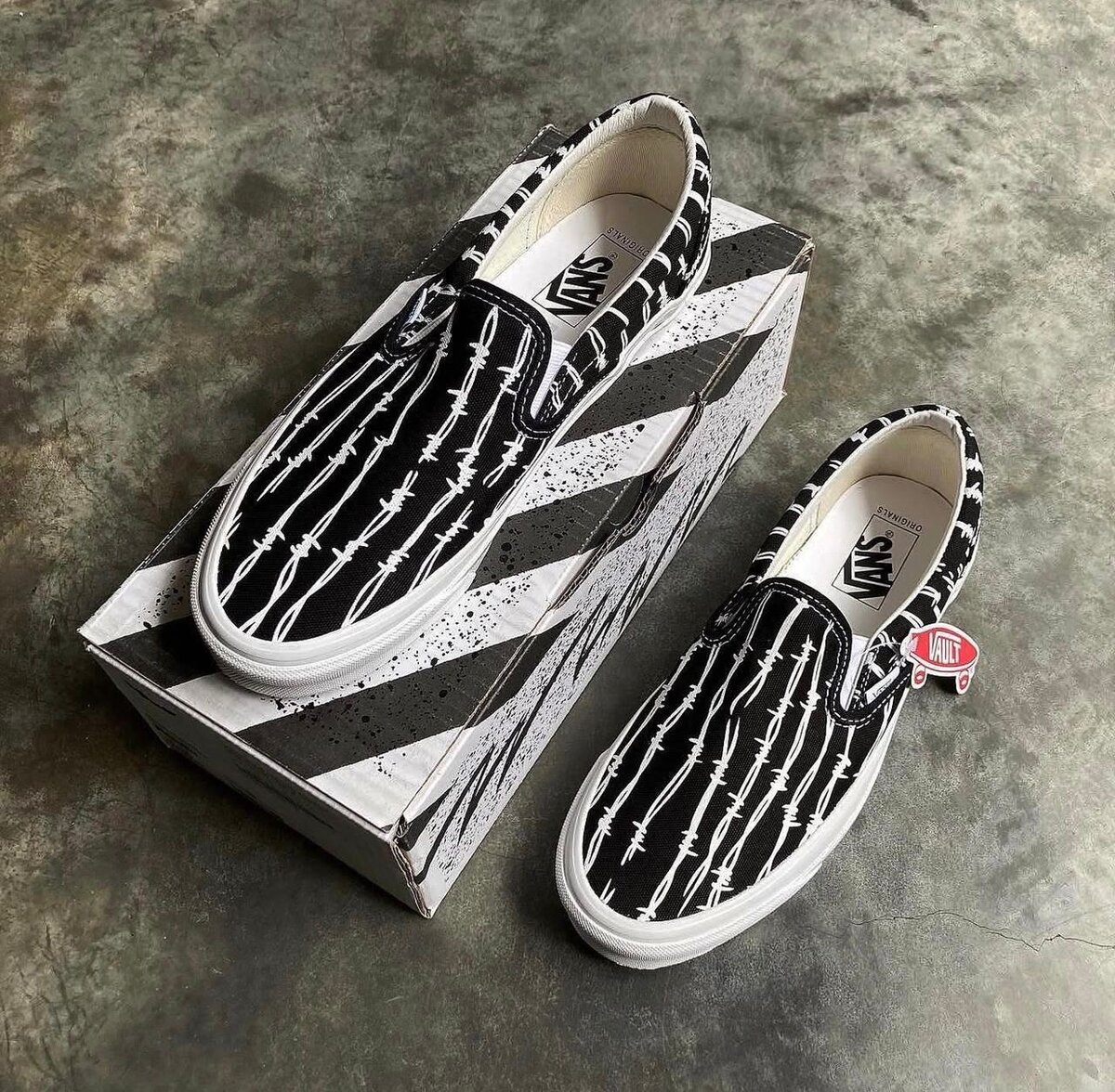 Vans Slip-On Noirs à Motif