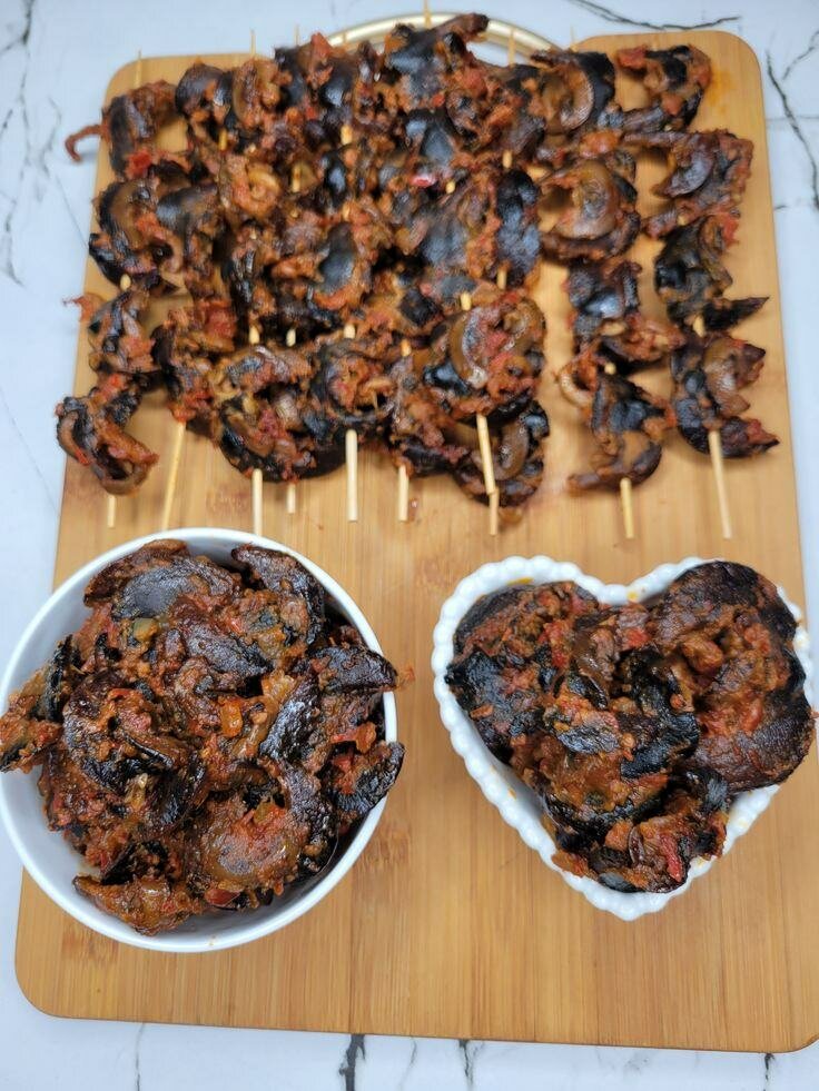 Escargots épicés en sauce