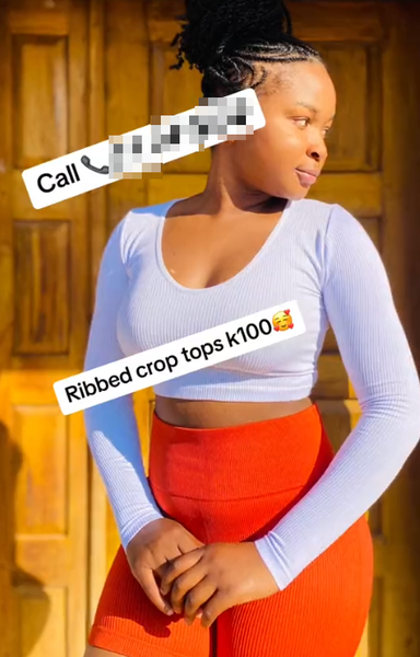 Women's short top with long sleeves