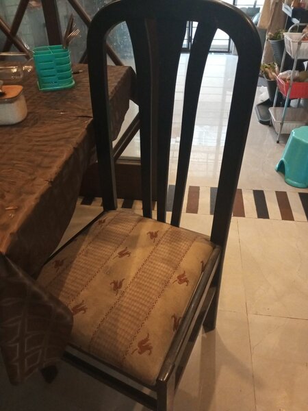 Dining table. With six chairs in good condition