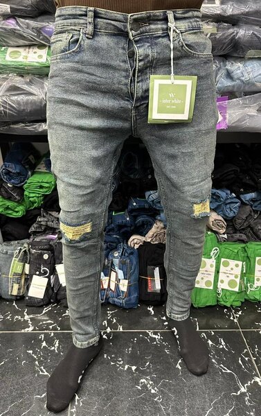 Jeans skinny déchirés homme