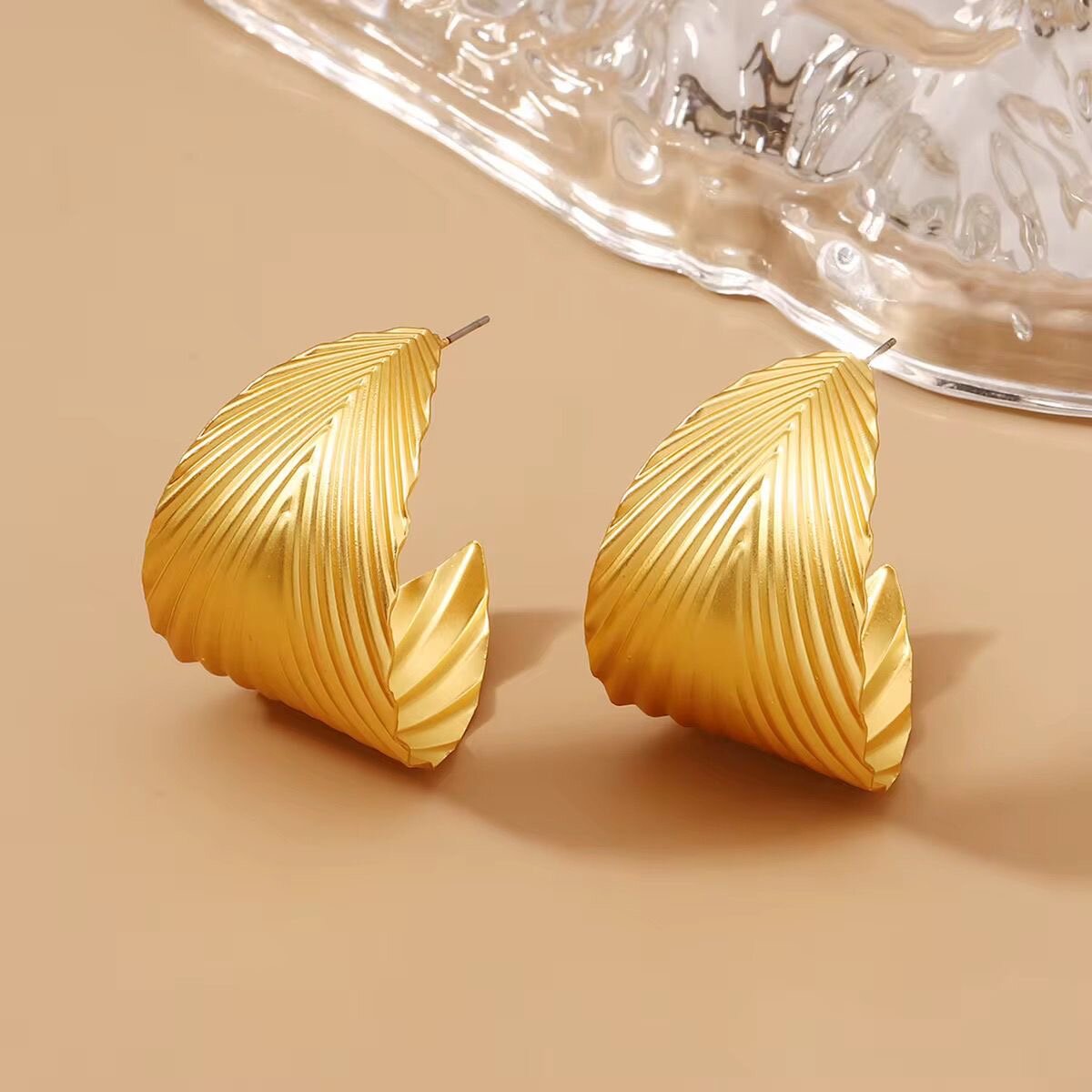 Boucles d'oreilles dorées exquises