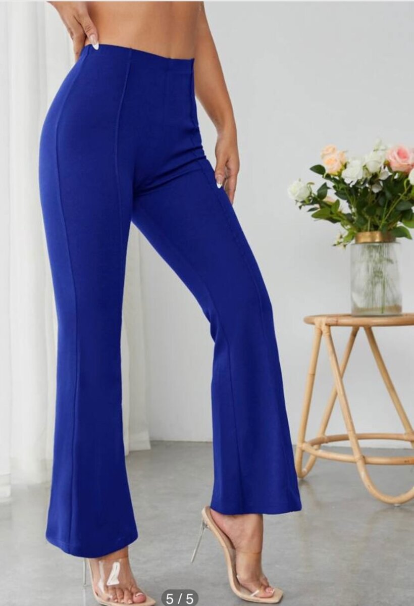 High waist flared trouser and ruffled shirt