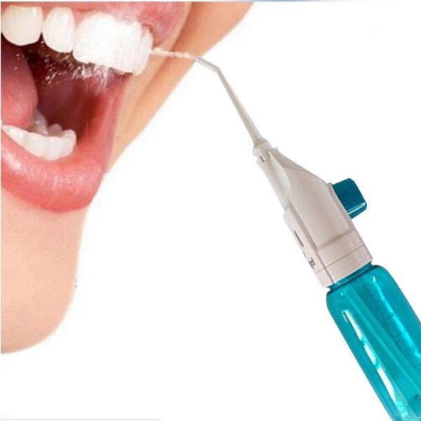Manual mouth flosser