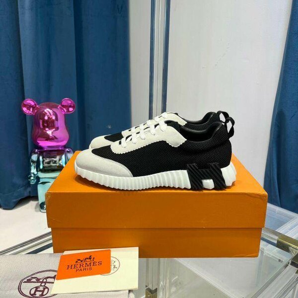 Hermes modernes en cuir noir