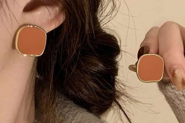 Beautiful fashionable earrings orange