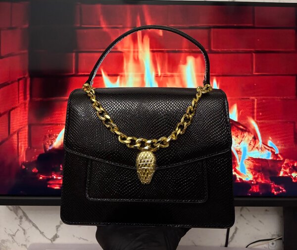 Sac à main élégant serpent