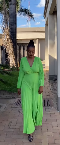 green jumpsuit