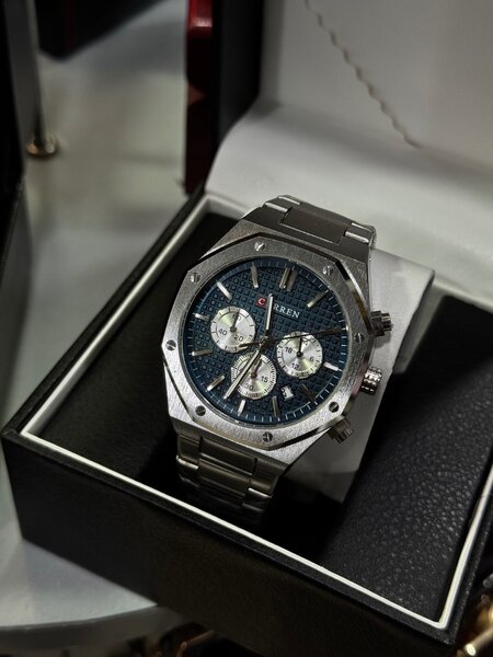 Часы фирмы curren