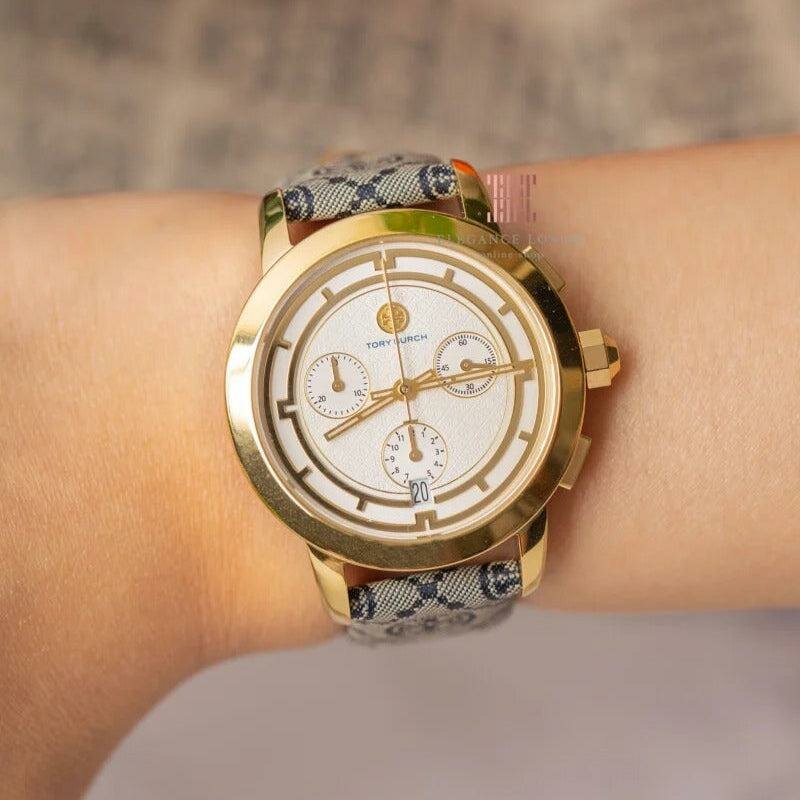 Montre élégante dorée femme