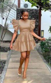 Beige dress, multi-layered sleeves and hem