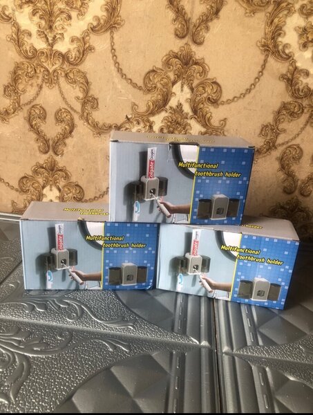 Toothbrush Holder with Automatic Toothpaste