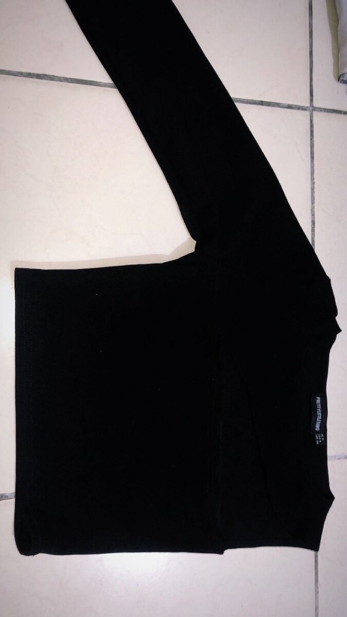 Top noir asymétrique mode