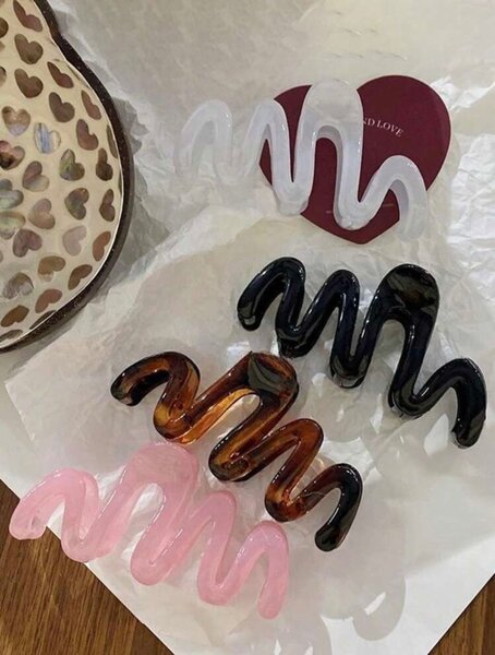 Pinces à cheveux ondulées élégantes