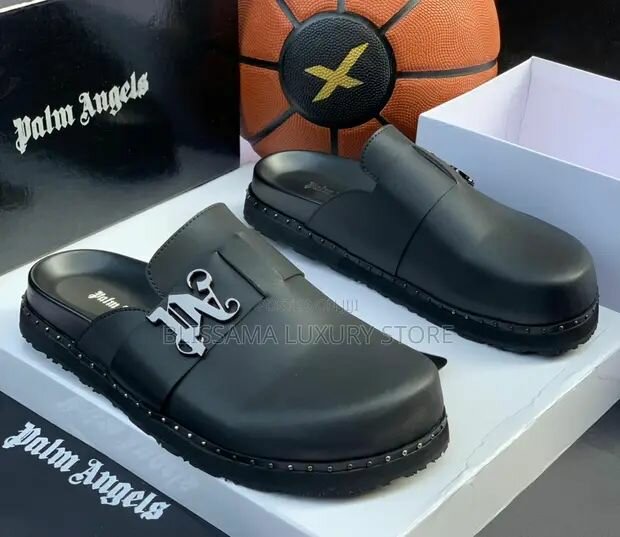 Mules en cuir avec boucle