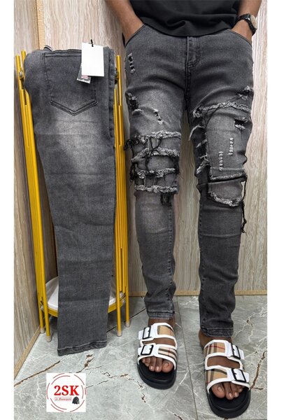 Jeans déchirés tendance homme