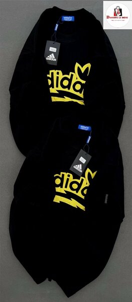 T-shirts noirs logo jaune