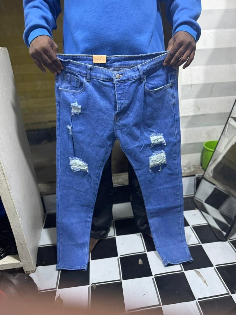 Jeans déchirés mode homme