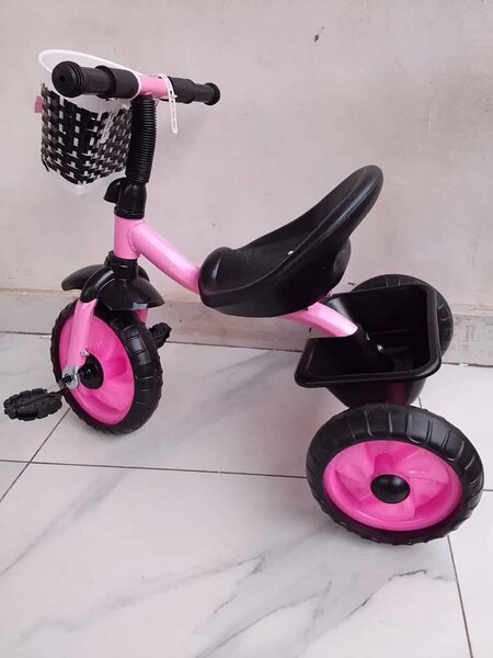 Tricycle rose pour enfants