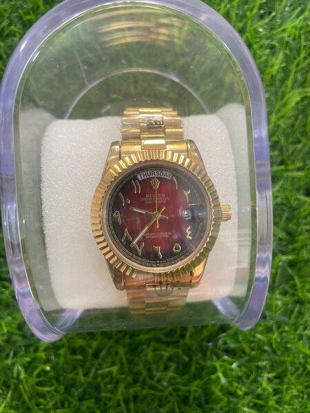 Golden wrist watch