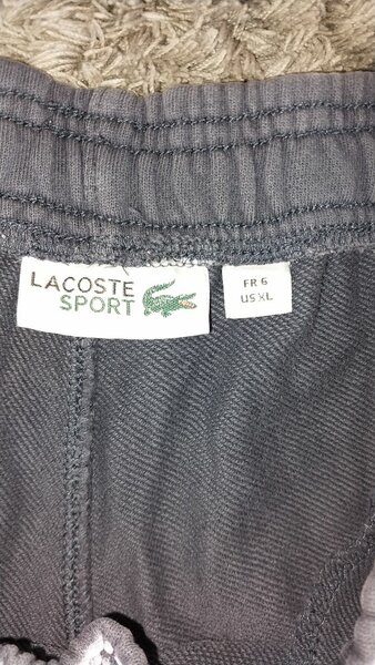Blue Lacoste shorts