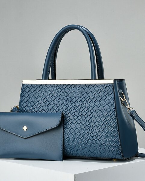 High-quality, stylish women's blue bag with an accessory