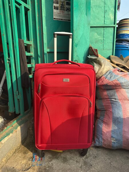 Valise à roulettes en tissu