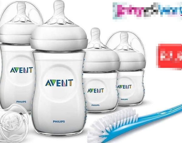 set of 4 bottles of Avent with a brush