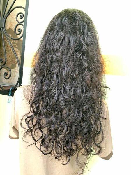 Extensions cheveux bouclés