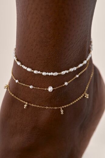 Chaîne au pied ou cheville