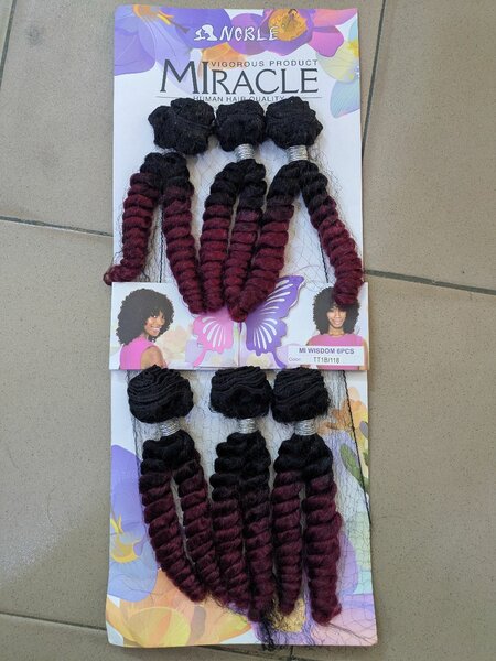 Extensions capillaires bouclés