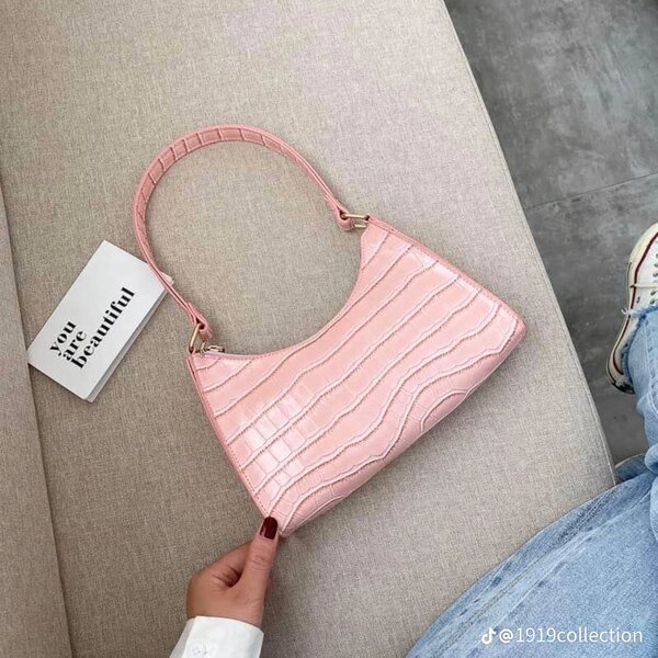 Mini leather baguette pink bag