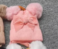 Hat with pompon for a girl pink