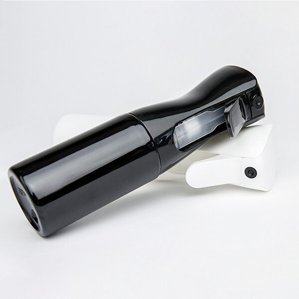 Vaporisateur pour l'entretien des cheveux