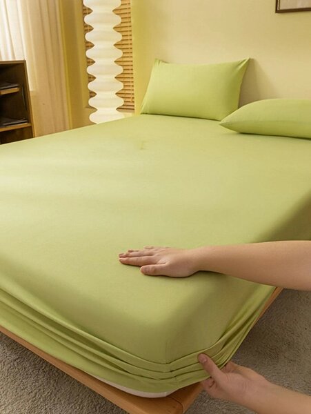 Linge de lit vert tendre