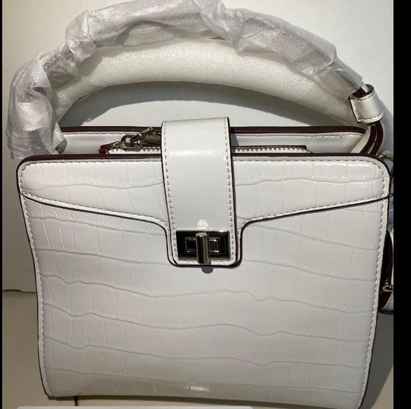 Women's white bag with embossed crocodile leather, handle and rotary lock