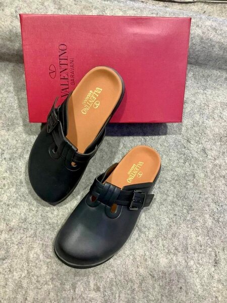 Sabots Valentino en cuir noir