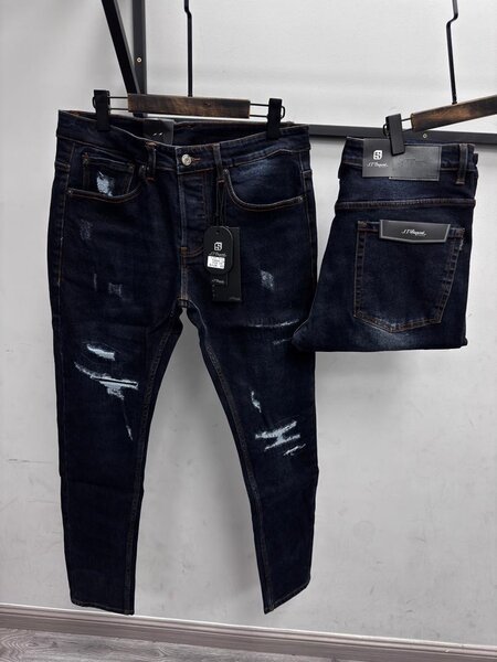 Jeans déchirés homme tendance